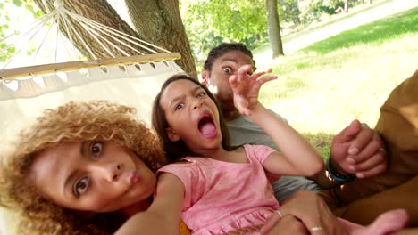 Lovely-African-American-family-making-silly-faces-and-posing