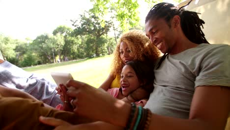 Photogenic-Multi-ethnic-family-enjoying-each-other's-company