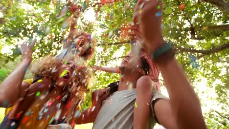 Excited-african-american-family-laughing-and-enjoying-the-moment-with-confetti