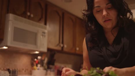 A-little-boy-helping-his-mom-prepare-food-in-the-kitchen