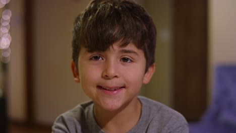 A-little-boy-smiling,-and-then-watching-his-sister-draw