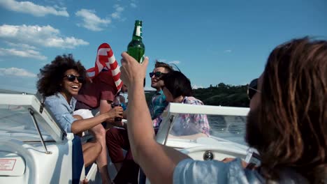 Group-of-happy-young-adults-toasting-each-other