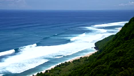 Ocean-near-green-mountain