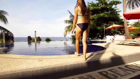 Girl-is-swimming-in-the-pool