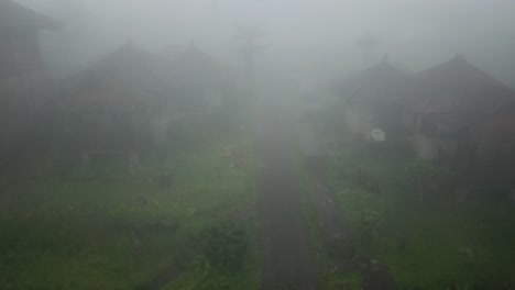 Approaching-Abandoned-Balinese-Houses-And-Infinity-Pool-Covered-With-Fog-4K