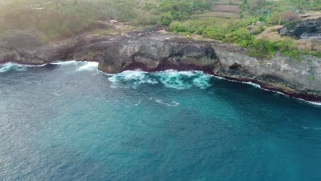 Aerial-view-by-drone-4k-camera.-Rocky-coast-with-high-cliffs