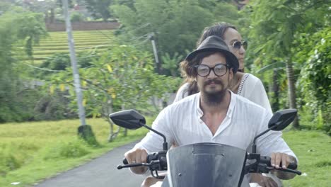 Beautiful-Couple-Having-Romantic-Road-Trip-on-Scooter