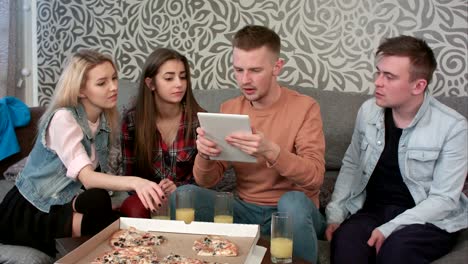 Nuce-teen-couple-communicate,-when-his-friend-with-tablet-interrupts-them