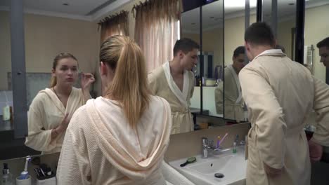 Attractive-young-couple-in-the-bathroom