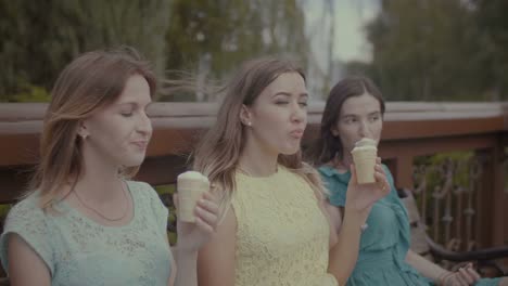 Lovely-women-refreshing-themselves-with-ice-cream