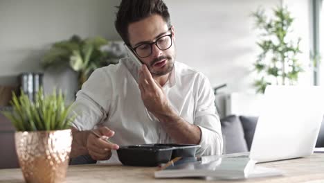 Multitasking-businessman-working-at-home-office