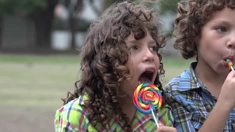 Brothers-Eating-Lollipop-Candy