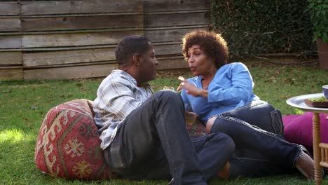 Mature-Couple-Relax-In-Garden-Together-Shot-On-R3D