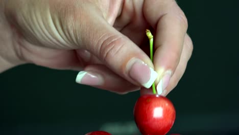 Young-Woman-With-Cherry