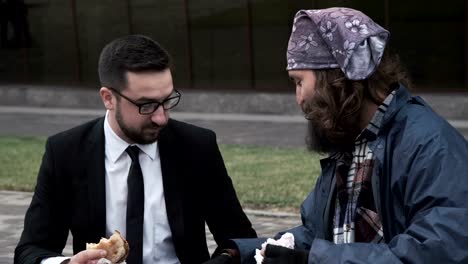 Cheerful-businessman-and-homeless