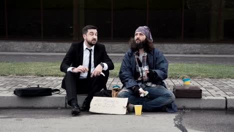 Businessman-and-homeless-on-pavement