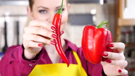 Woman-choosing-between-chilli-and-bell-pepper