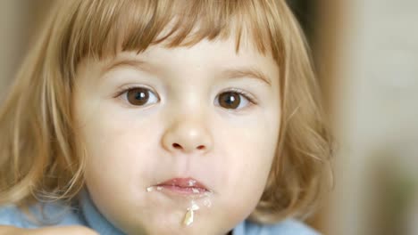 Smiling-little-boy-Eating-close-up.--4K-UHD