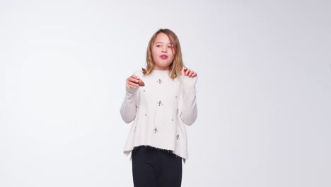 Girl-Eating-Chocolate-And-Jumping-Against-White-Background