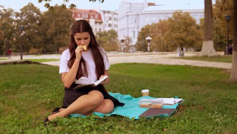 girl-eating-snack-outdoor