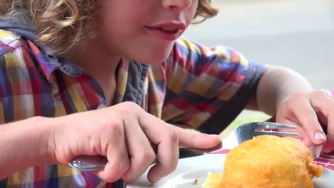 Young-Boy-Eating-with-Fork