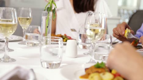 Group-of-friends-eating-dinner-together