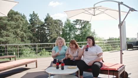 Three-Women-Having-Fast-Food-Lunch