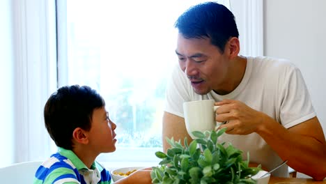 Father-and-son-having-breakfast