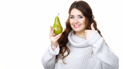 Woman-holds-pear-fruit-give-thumb-up-gesture,-isolated