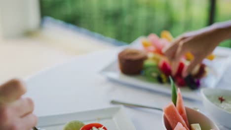 Couple-Enjoying-Breakfast-at-Resort