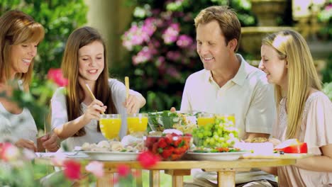 Summer-living-of-family-dining-on-healthy-salad