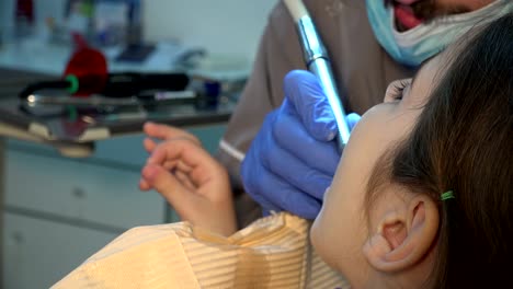 Small-kid-patient-visiting-specialist-in-dental-clinic.-Dental-Treatment