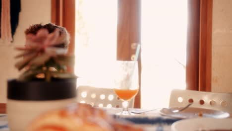 Young-boy-finishing-breakfast-and-leaving-from-house-kitchen