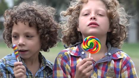 Brothers-Eating-Lollipop-Candy