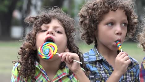 Brothers-Eating-Lollipop-Candy