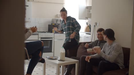 Group-Of-Students-Eating-Breakfast-In-Shared-House