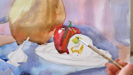 A-young-artist-in-an-art-workshop-draws-a-still-life-from-nature-in-watercolor