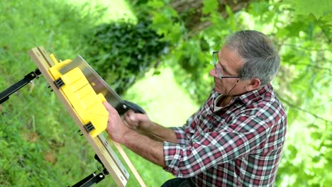 Cutting-mitered-cuts-using-saw-and-mitre-box