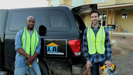 Portrait-of-two-construction-workers