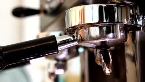 coffee-grinder-machine-in-cafe-restaurant