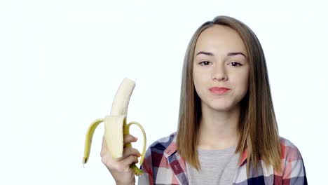 Smiling-girl-biting-banana
