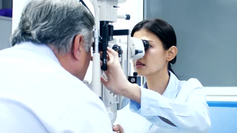 Asian-aged-man-test-eye-glass-at-clinic.-People-with-healthcare-and-medical-concept.