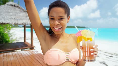 African-American-girl-with-party-drink-on-beach