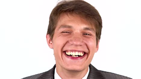 Businessman-with-a-laughing-and-looking-at-the-camera