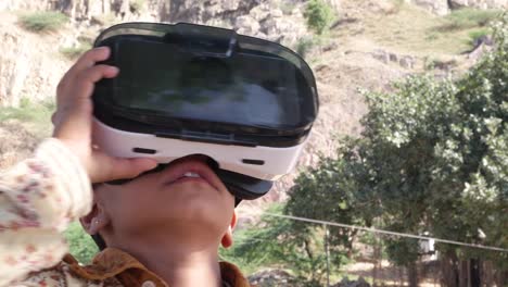 Little-Indian-kid-with-a-VR-virtual-reality-headset