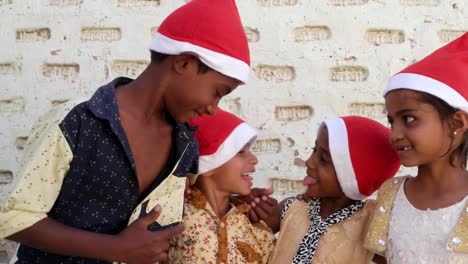 Kids-smiling-at-the-camera-and-sticking-their-tongue-out-at-each-other