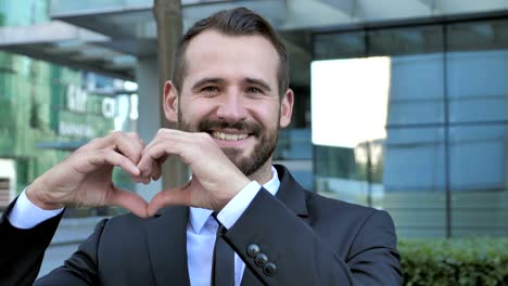 Handmade-Heart-Shape-by-Businessman