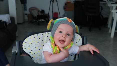 Beautiful-Baby-Boy-With-A-Funny-Wool-Hat-On-The-Head