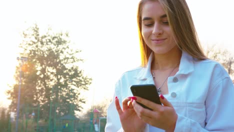 Woman-Using-Smartphone-Looking-Happy