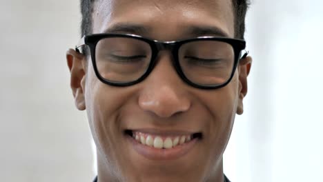 Close-Up-of-Smiling-Face-of-African-Businessman-Looking-at-Camera